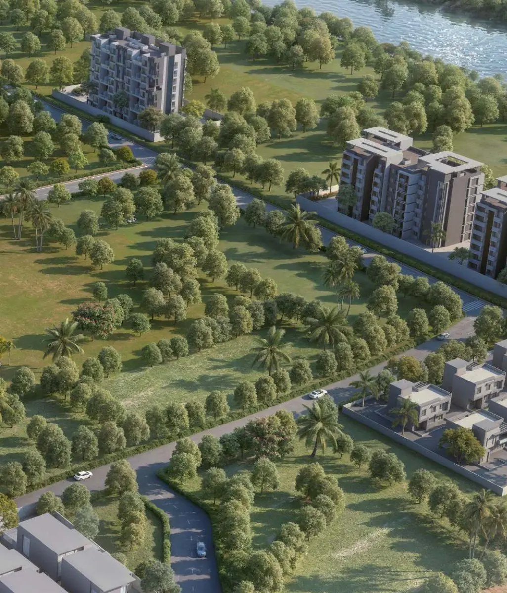 Raahee Parna flats surrounded by greenery near the Indrayani River, Dudulgaon